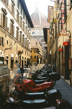 Florence street with Duomo.